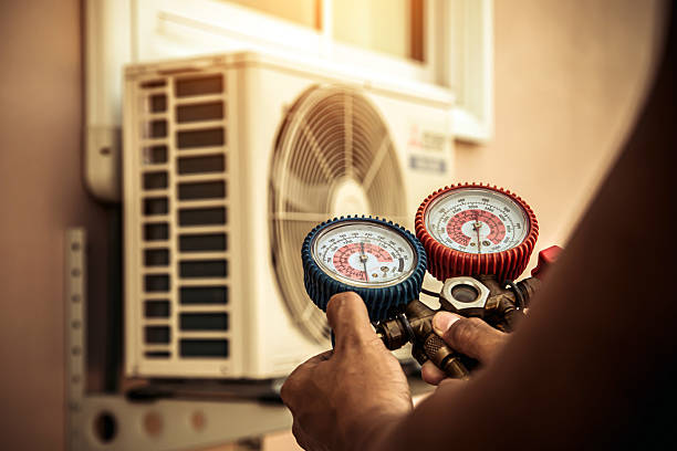 Professional Air Conditioning Service technician working in Dade City, FL